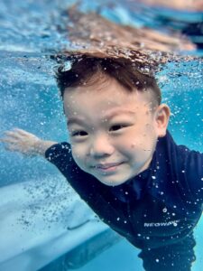Read more about the article What Age Can a Child Start Swimming Lessons? A Guide by Age